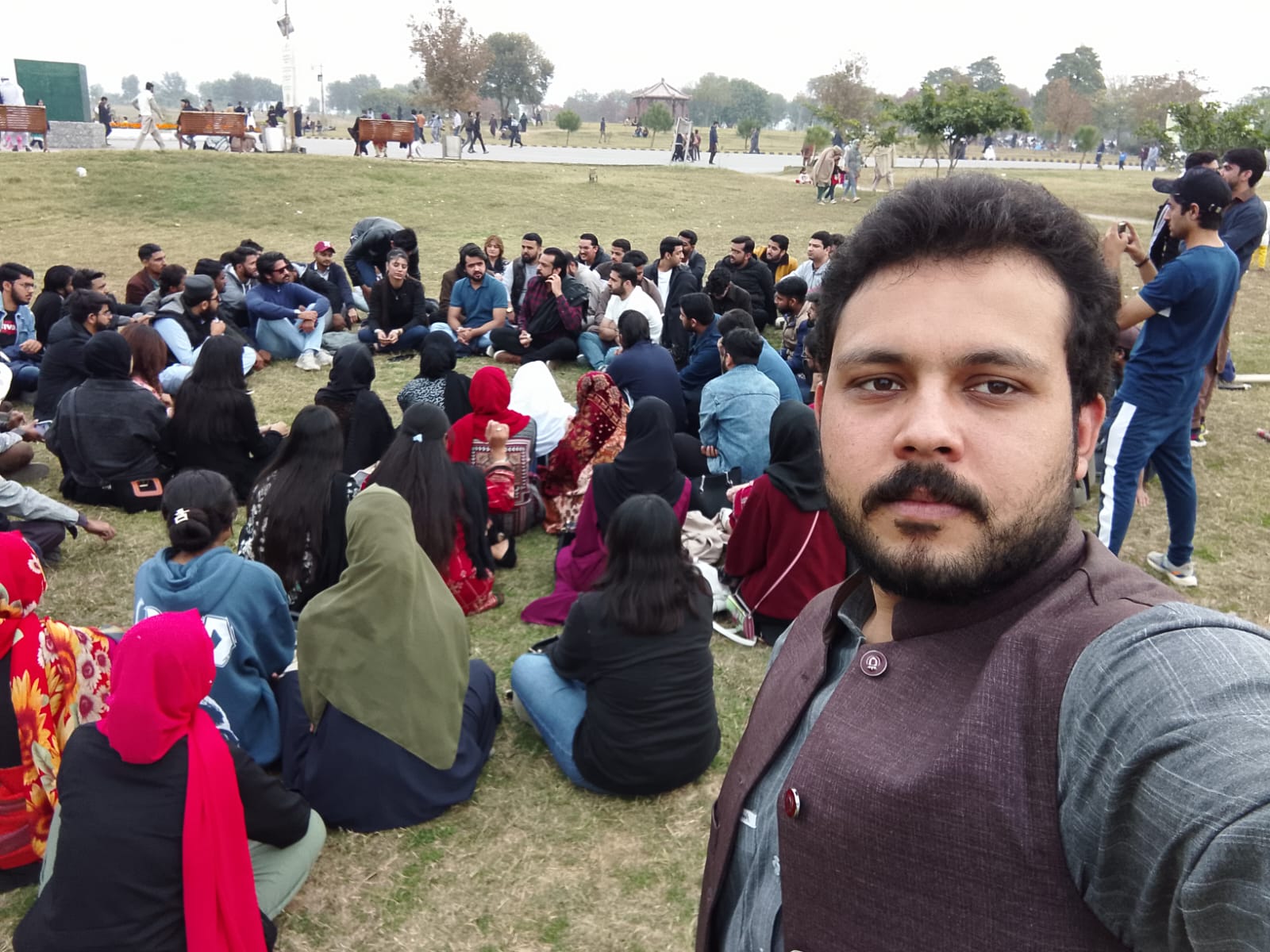 Abdullah Khan at an outdoor technology community meetup in Islamabad