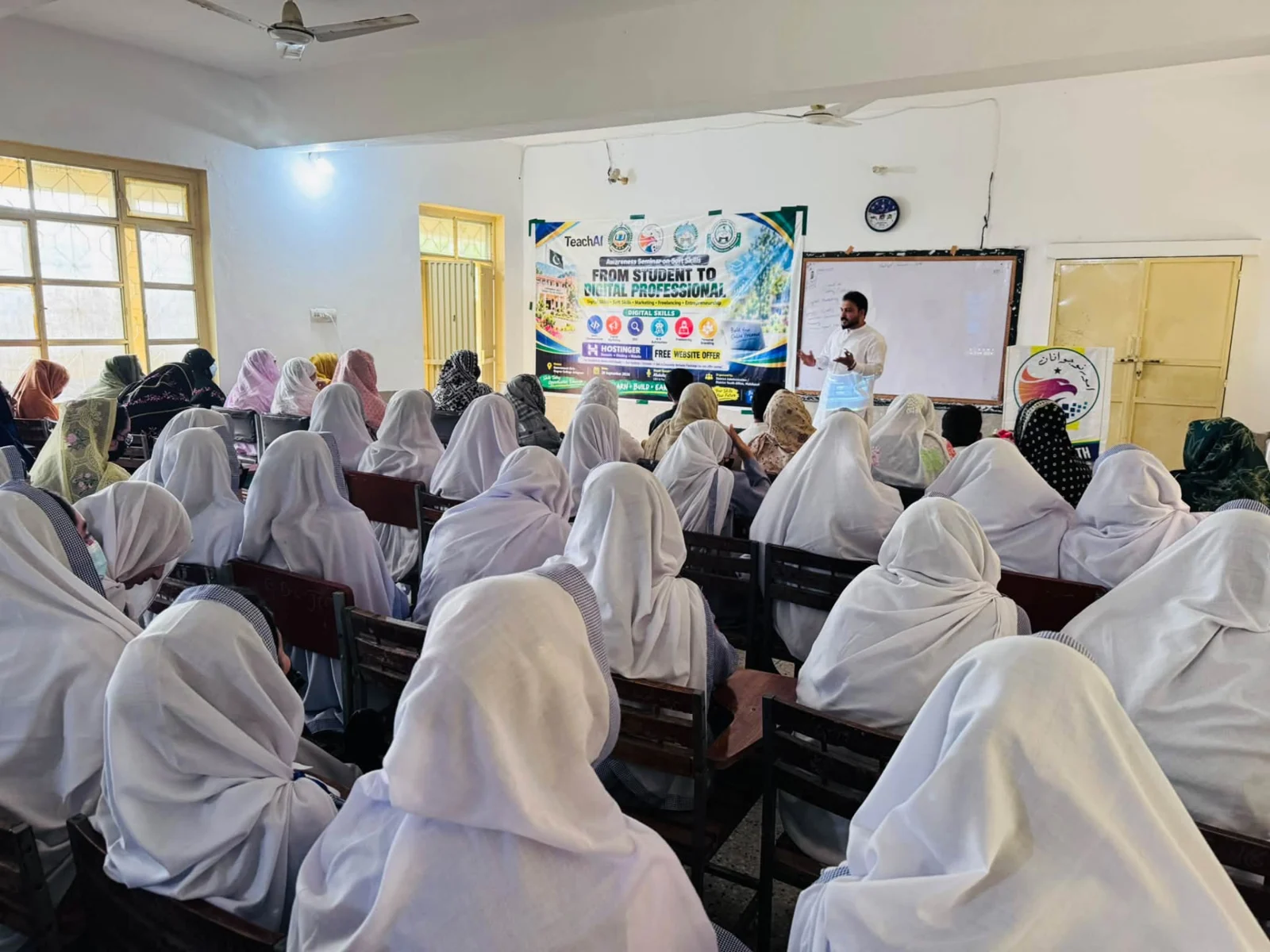 Abdullah Khan addressing students at the Digital Skills and Soft Skills seminar at Government Degree College Julagram.